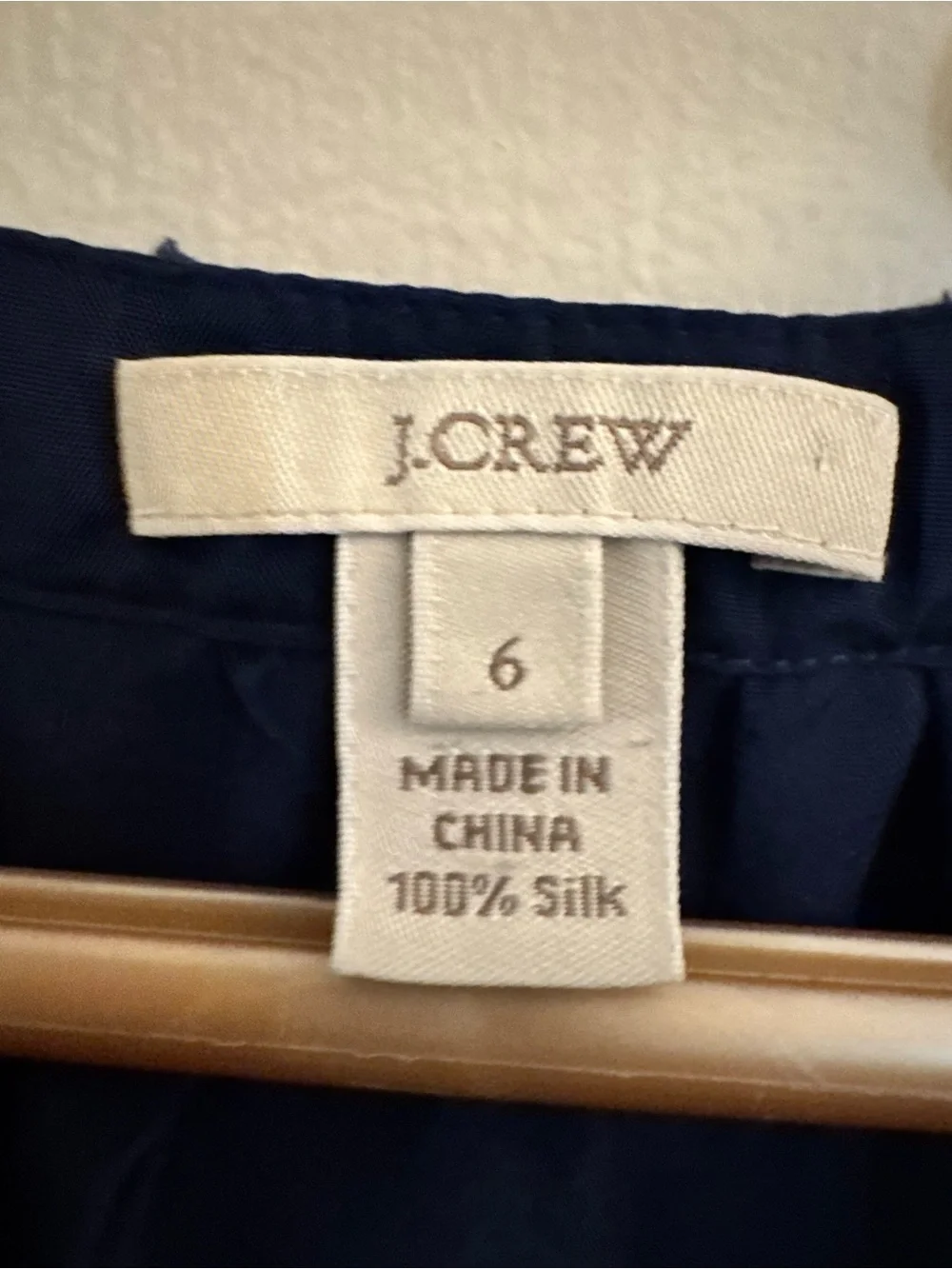 J. Crew navy blue silk blouse with a distinctive rosette ruffle collar Size 6